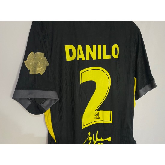 Al-Ittihad black jersey with the Golden League logo + a free Al-Ittihad logo sticker.