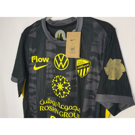 Al-Ittihad black jersey with the Golden League logo + a free Al-Ittihad logo sticker.